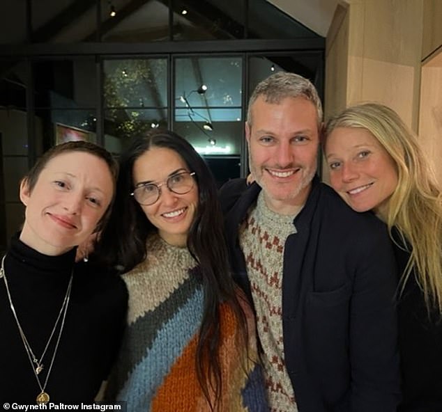 Fun group: Gwyneth Paltrow posed for a rare photo with her friend Demi Moore.  The image that was shared on Instagram on Wednesday showed the women with two other friends, and they were all arm in arm.