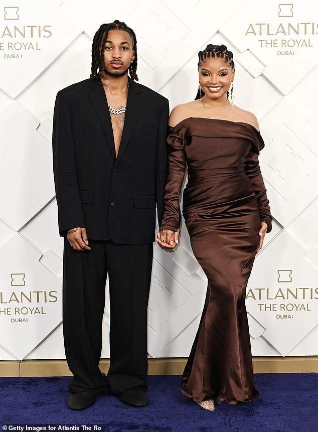 Luxury night out: Halle Bailey was a vision in an off-the-shoulder brown dress as she attended the opening of Dubai's new luxury hotel, Atlantis The Royal