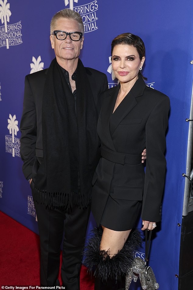 Admission: Harry Hamlin has revealed the real reason his wife Lisa Rinna acrimoniously left Real Housewives of Beverly Hills after eight seasons, Page Six reports (pictured together on Jan. 6)