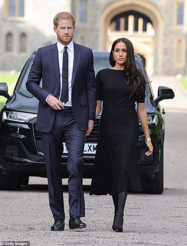 Prince Harry and Meghan Markle arrive for the walk at Windsor Castle following the death of Queen Elizabeth II.  Harry responded to claims that his wife bullied members of the royal household