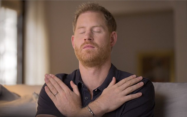 Prince Harry, pictured here exercising in a therapy session, claims he called his therapist after a physical fight with his brother William.