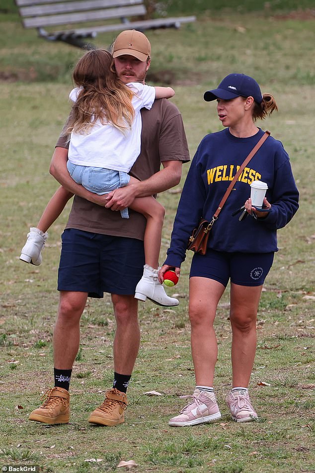 The healthy-looking Kate Ritchie took her eight-year-old daughter to the park with a mystery man on Saturday after a stint in rehab for 