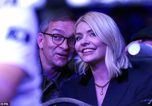 Night out: Holly Willoughby, 41, was spotted out on a rare public date with her husband Daniel Baldwin on Saturday as they enjoyed the KSI v FaZe Temperrr boxing match