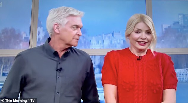 I have you!  Holly Willoughby appeared to drop an 'F-bomb' during This Morning on Thursday when her co-host Phillip Schofield gave her a scare live on air.