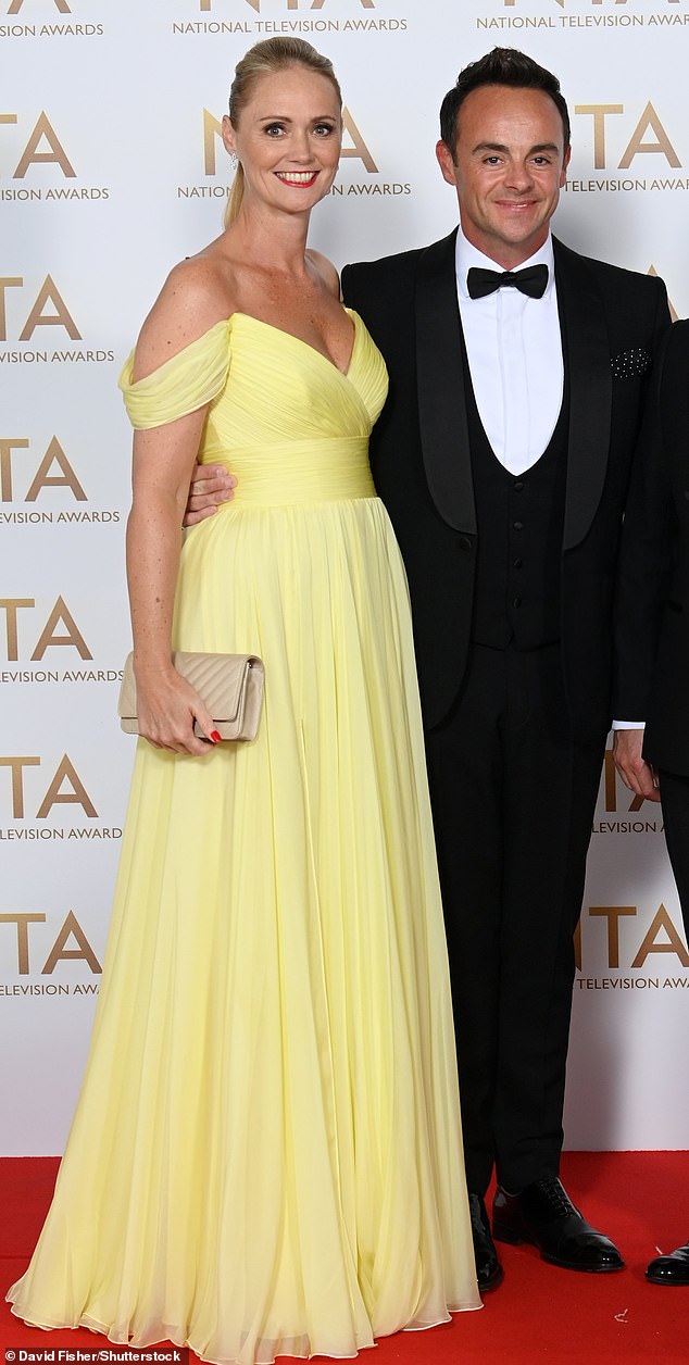 Settled: Ant McPartlin (right) with his second wife Anne-Marie (left) in 2021