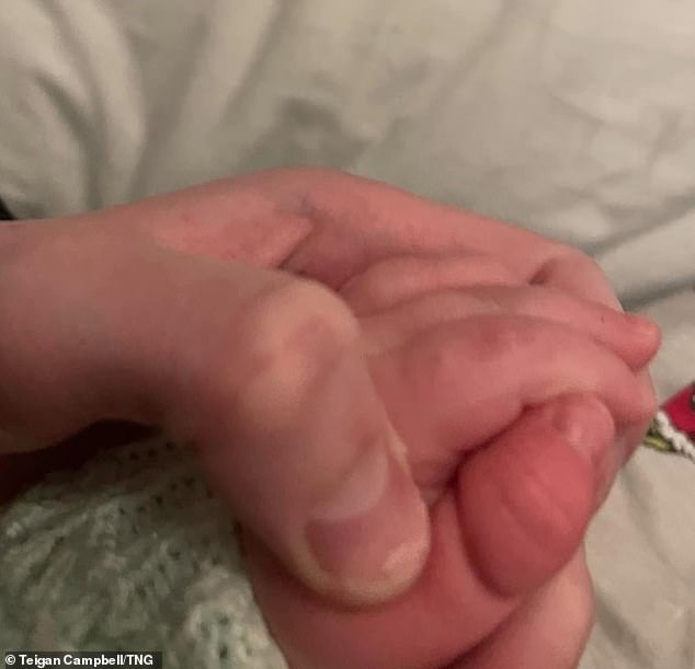 Teigan Campbell, from Coventry, had the 'shock of my life' when she discovered her baby's finger had become entangled in the cord of a mobile above her crib.