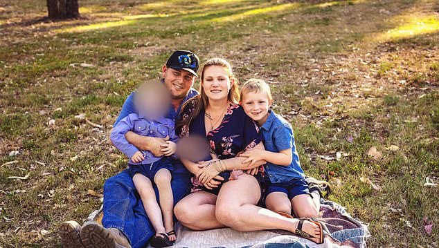 Riley Wells (pictured right) of Roma was left in the overturned car.  He is pictured here with his parents, Ian Wells and Shanowahh Dennis, who were not involved in the accident.