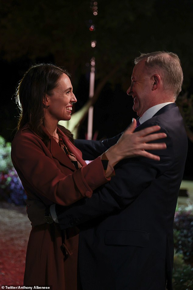 The Australian Prime Minister posted a photo of him and Ardern in a warm embrace minutes after she announced her resignation in an emotional press conference (pictured)