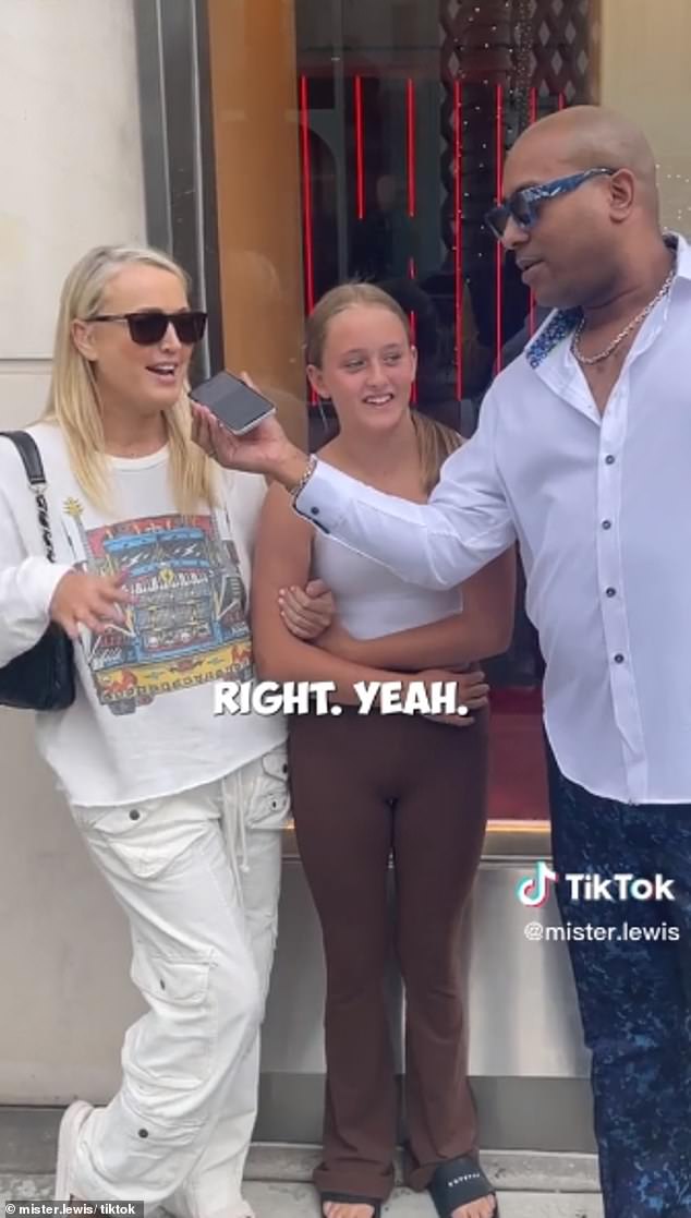 American TikToker Mister Lewis (right) had no idea he was talking to radio royalty when he interviewed Jackie 'O' Henderson (left) and her daughter Kitty (center) on vacation in California.