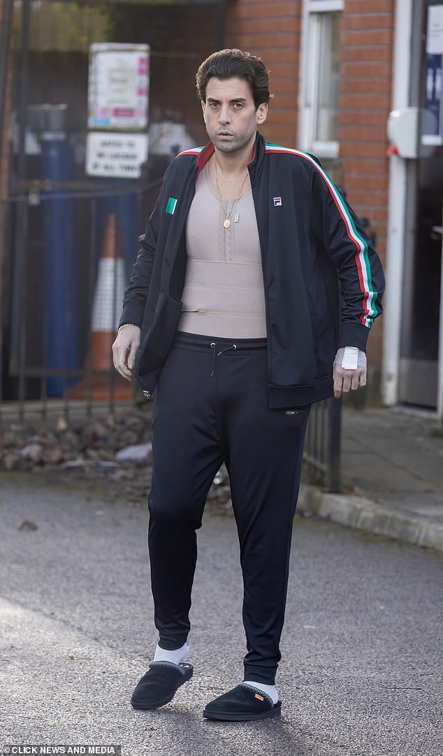 Recovery begins: James Argent was seen for the first time Thursday since 'surgery to remove excess skin'.  He left a cosmetic surgery hospital in Manchester wrapped in bandages