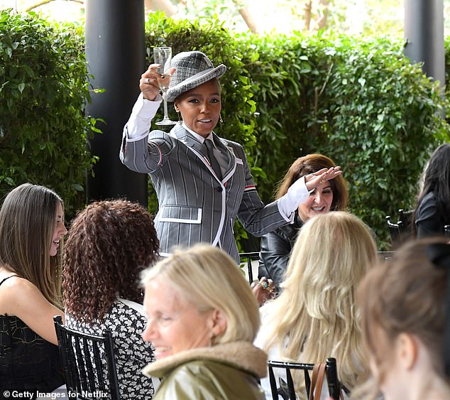 Health!  Eight-time Grammy nominee Janelle Monáe showed off her sartorial sense of style as she hosted a ladies' luncheon at the Hotel Bel-Air in Los Angeles on Thursday.