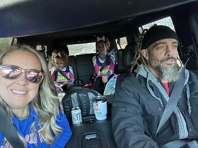 Professional wrestler Jay Briscoe, right, was killed in a car accident while returning from his daughters' cheerleading competition Tuesday night.  They are shown here addressing the competition.  I was 38 years old