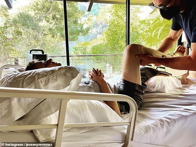 Jeremy Renner shared a photo of his physical therapy session from his hospital bed at his home in Lake Tahoe, Nevada.