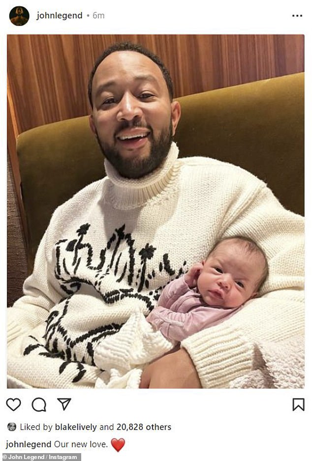 'Our new love': John Legend appeared absolutely smitten with his newborn baby Esti in a snap shared on his Instagram on Wednesday