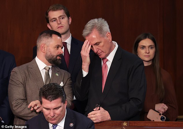 McCarthy spent much of the third day of votes walking around the chamber speaking to both allies and holdouts (seen speaking with Republican Rep.-elect Cory Mills of Florida)