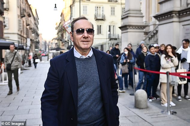 Oscar-winning actor Kevin Spacey has spoken out as he prepares to collect a film award in Italy this week, days after denying seven sex offense charges.  Pictured: Spacey is seen walking the streets of Turin on Friday, the same day as his virtual court appearance in London.