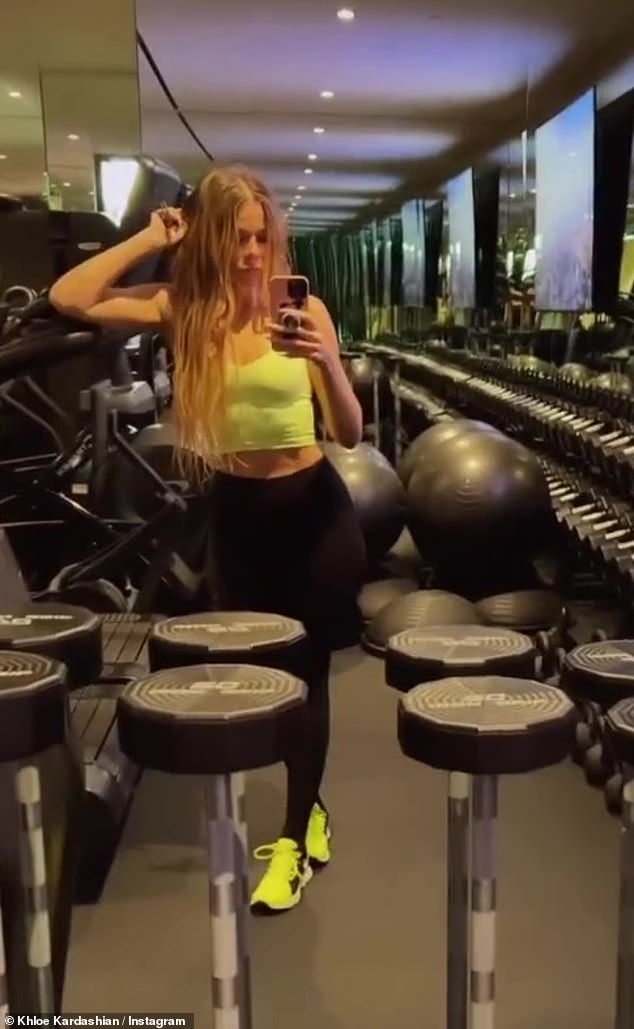 Dedicated: Khloe Kardashian stuck to her wellness routine on Thursday while hitting the gym before showing off new Good American pieces