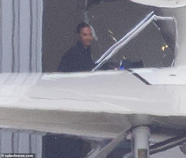 She's off!  Kim Kardashian was seen smiling as she boarded a private plane on Friday morning after she learned that her ex-husband Kanye West had gotten married.