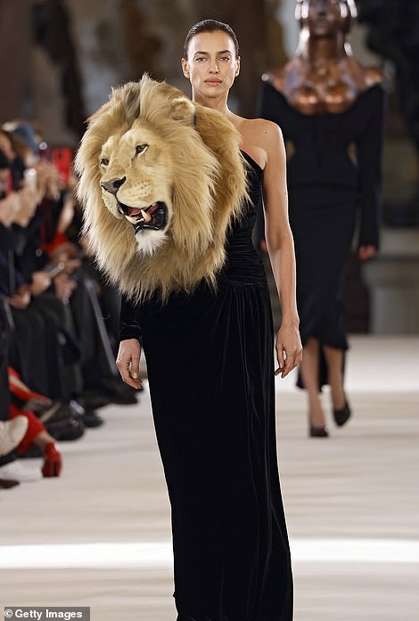 Double take: While the 25-year-old makeup mogul certainly turned heads in her faux lion's head gown, she seemed shocked to see the 37-year-old model nearly steal her spotlight on the runway when people started instantly access which of the women wore it best (Shayk seen above)