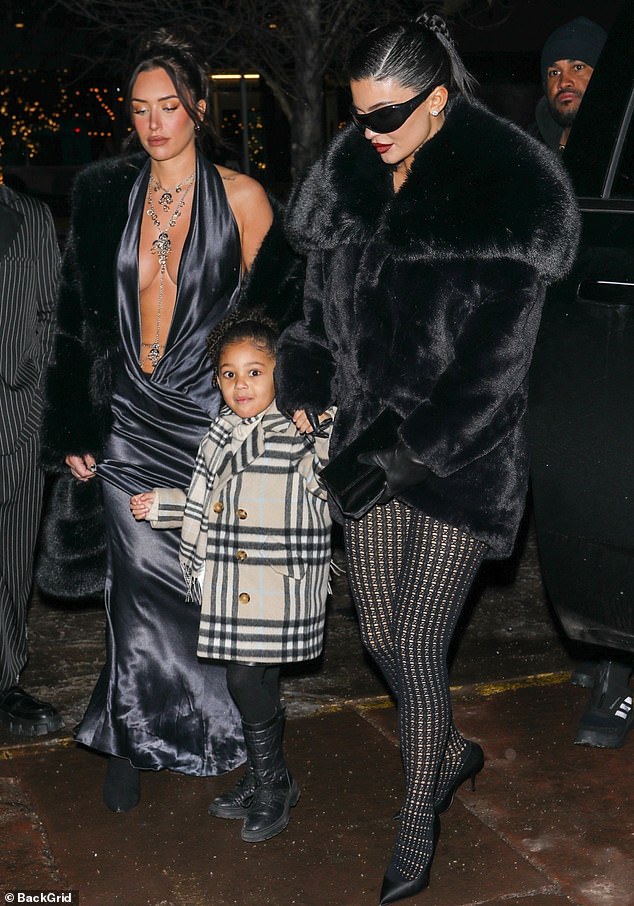 Plus-one: Young Stormi Webster spent part of her New Year's Eve as her mother Kylie Jenner's plus-one when they rang in 2023 in Aspen