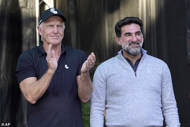 LIV Golf CEO Greg Norman, left, applauds Yasir Al-Rumayyan, Governor of the Saudi Arabian Public Investment Fund, at the LIV Golf Invitational-Chicago tournament on September 18.