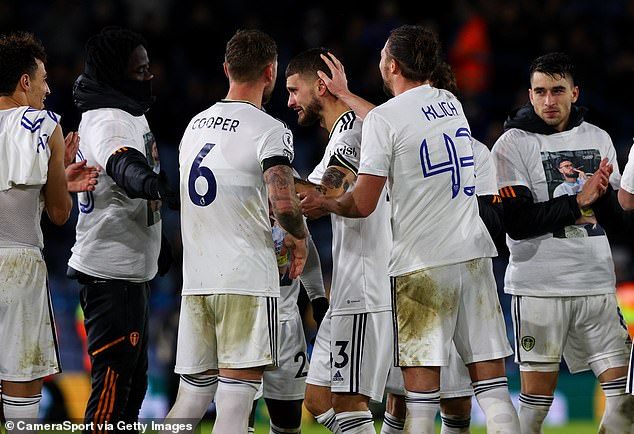 Leeds' Mateusz Klich's team-mates applaud him off the pitch after coming close to moving to America