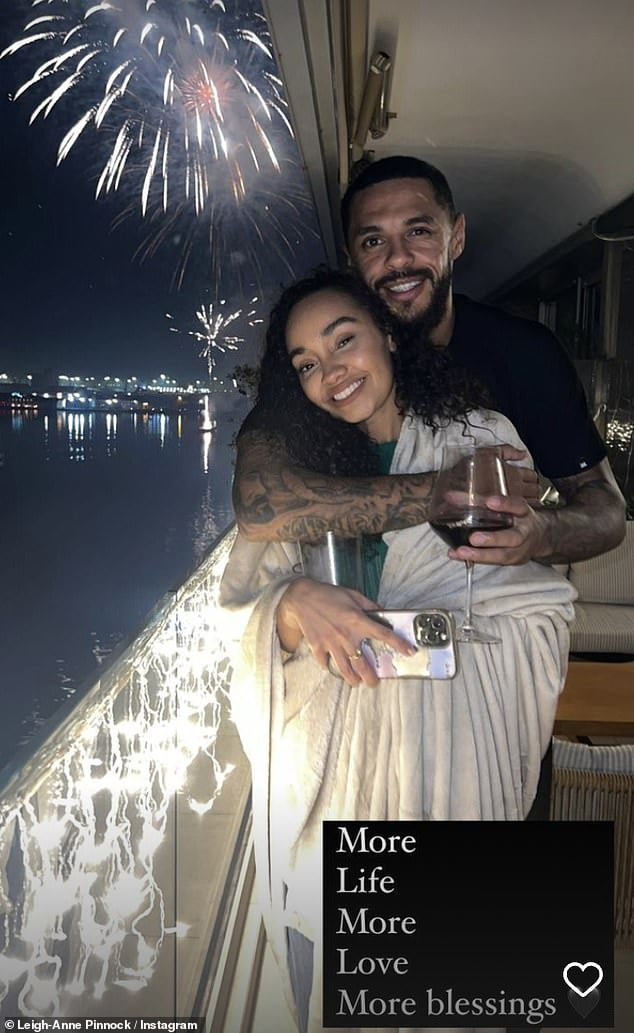 Sweet: Leigh-Anne Pinnock put on a cozy display with her fiancé Andre Gray as they watched the fireworks on New Year's Eve