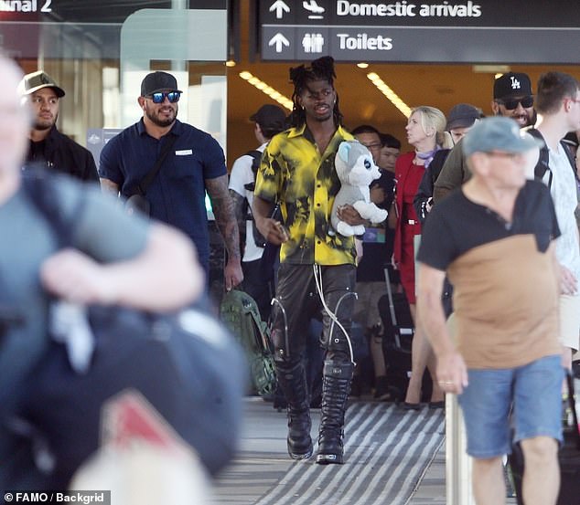 Lil Nas X, 23, (pictured) looked fresh and ready for work on Friday when he touched down at Perth airport after a night out in Sydney.