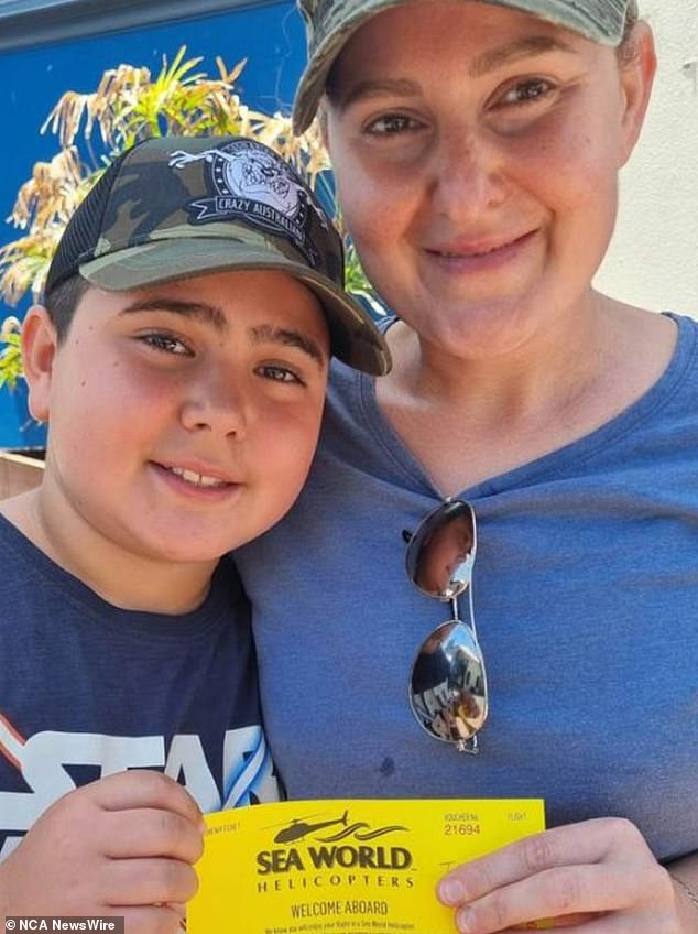 Vanessa Tadros and her son Nicholas, 10, before boarding the helicopter.  News Nine Credit: NCA NewsWire