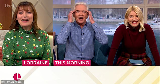 Cheeky: Phillip Schofield, 60, was stunned on Wednesday after Lorraine Kelly, 63, joked that she was in a three-way relationship with him and Holly Willoughby, 41.