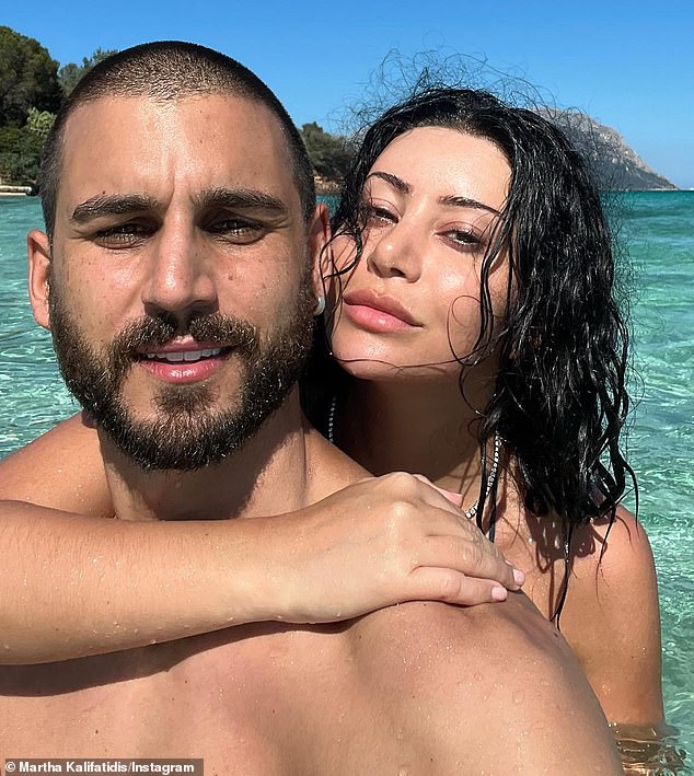 Married At First Sight star Michael Brunelli (left) has hinted that he and fiancée Martha Kalifatidis (right) will soon welcome a baby girl.