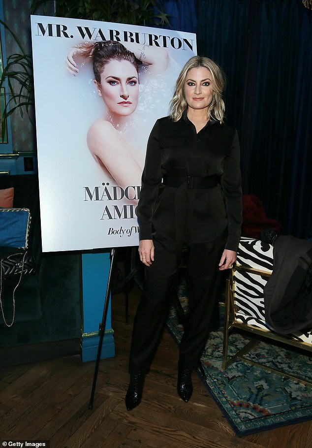 The Latest: Mädchen Amick, 52, talks about her son Sly Alexis' battle with bipolar 1 disorder and the efforts she's made to advance mental health with her nonprofit Don't Mind Me foundation.  She was photographed in Los Angeles in 2020