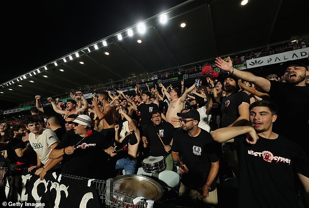 A-League fans have been criticized for 'burdening families' by angry fans during the Western Sydney Wanderers game against Central Coast Mariners in Gosford (Wanderers fans pictured celebrating during the game)