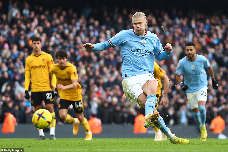 Erling Haaland (right) helped Manchester City close the gap between league rivals at the top of the Premier League table.