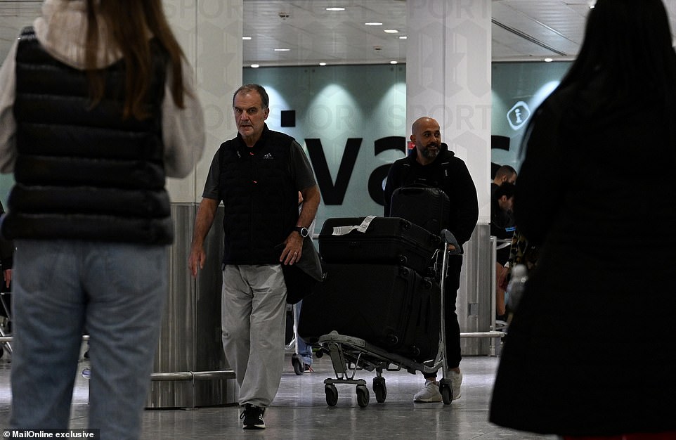 Marcelo Bielsa pictured arriving at Heathrow ahead of Everton talks