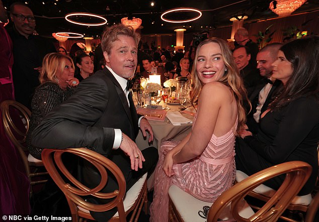 Margot Robbie and Brad Pitt sat next to each other at the 2023 Golden Globes after THAT kiss in their new movie Babylon