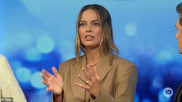 Margot Robbie has revealed the surprising reason why her friends at school call her 'Worm'.  Pictured: Margot on Tuesday night's episode of The Project