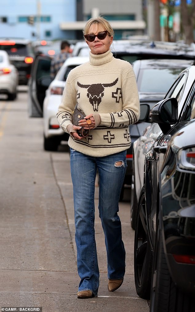 Chic: Melanie Griffith, 65, looked chic while shopping for furniture in Los Angeles on Wednesday