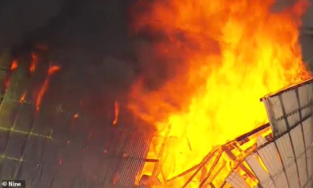 A fruit packing warehouse burst into flames in eastern Melbourne on Tuesday afternoon.