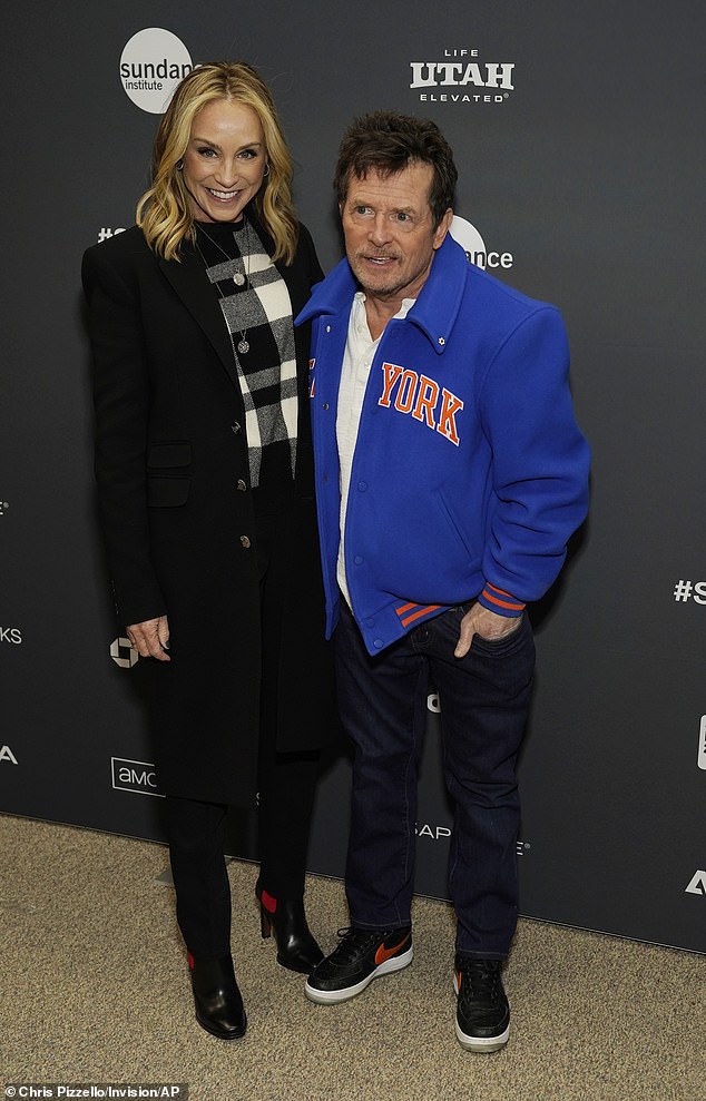 Bond: Michael J. Fox seemed in good spirits when his wife Tracy Pollan joined him at the premiere of his documentary.