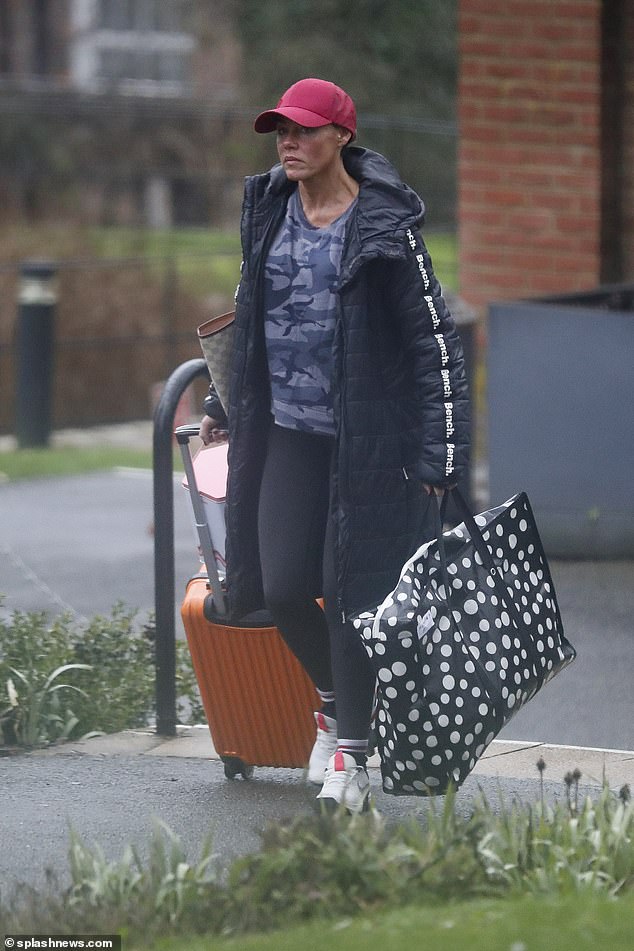 Disappointed: Michelle Heaton didn't look in the best of spirits as she left the Dancing On Ice contestants' hotel on Monday morning after her tearful debut on the show