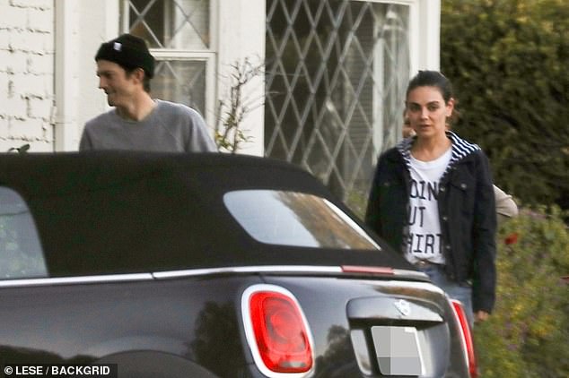 Looking laid back: Mila Kunis and Ashton Kutcher stepped out in casual ensembles in Los Angeles on Friday