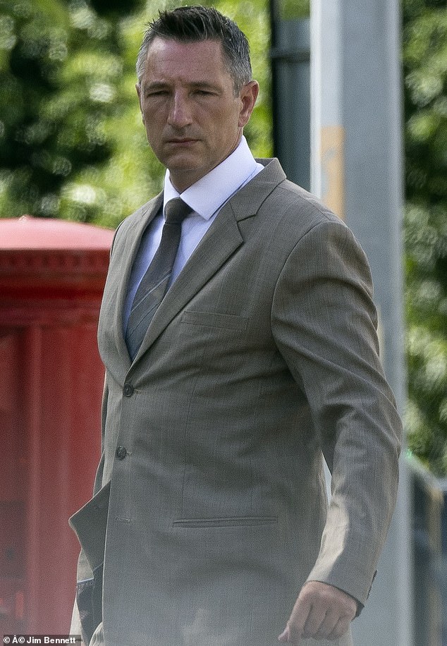 Businessman Simon Giles, 44, arrives at Maidstone Crown Court for a pre-hearing