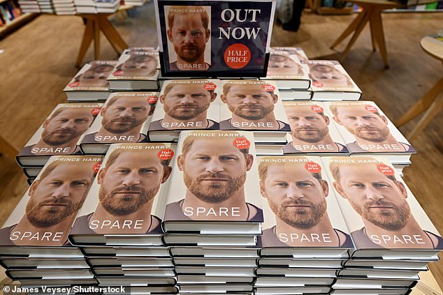 Prince Harry has revealed that he has enough material to publish a second memoir and has deleted almost half of the material he had written in a first draft.  Pictured: Copies of Harry Spare's memoirs stacked in London's Foyles bookstore.