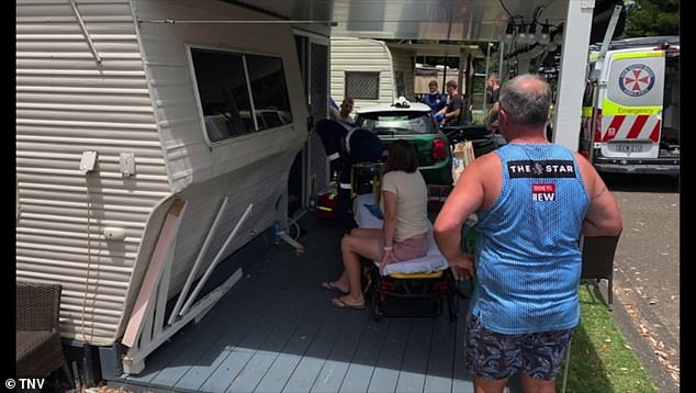 Four children and a mother were injured after a car crashed into the terrace of the camper they were sitting on (pictured)