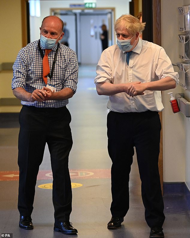 Nick Hulme (pictured with Boris Johnson at Colchester Hospital), who runs Ipswich and Colchester hospitals, branded them 'not safe places', adding the public had 'come to accept the totally unacceptable'