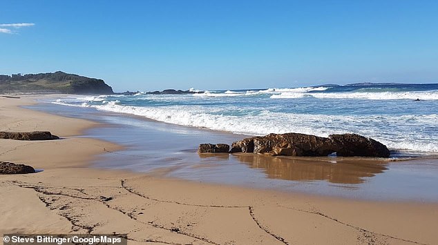 A police officer drowned after saving the life of a teenager caught in a current at Bogola Beach (pictured) on Sunday