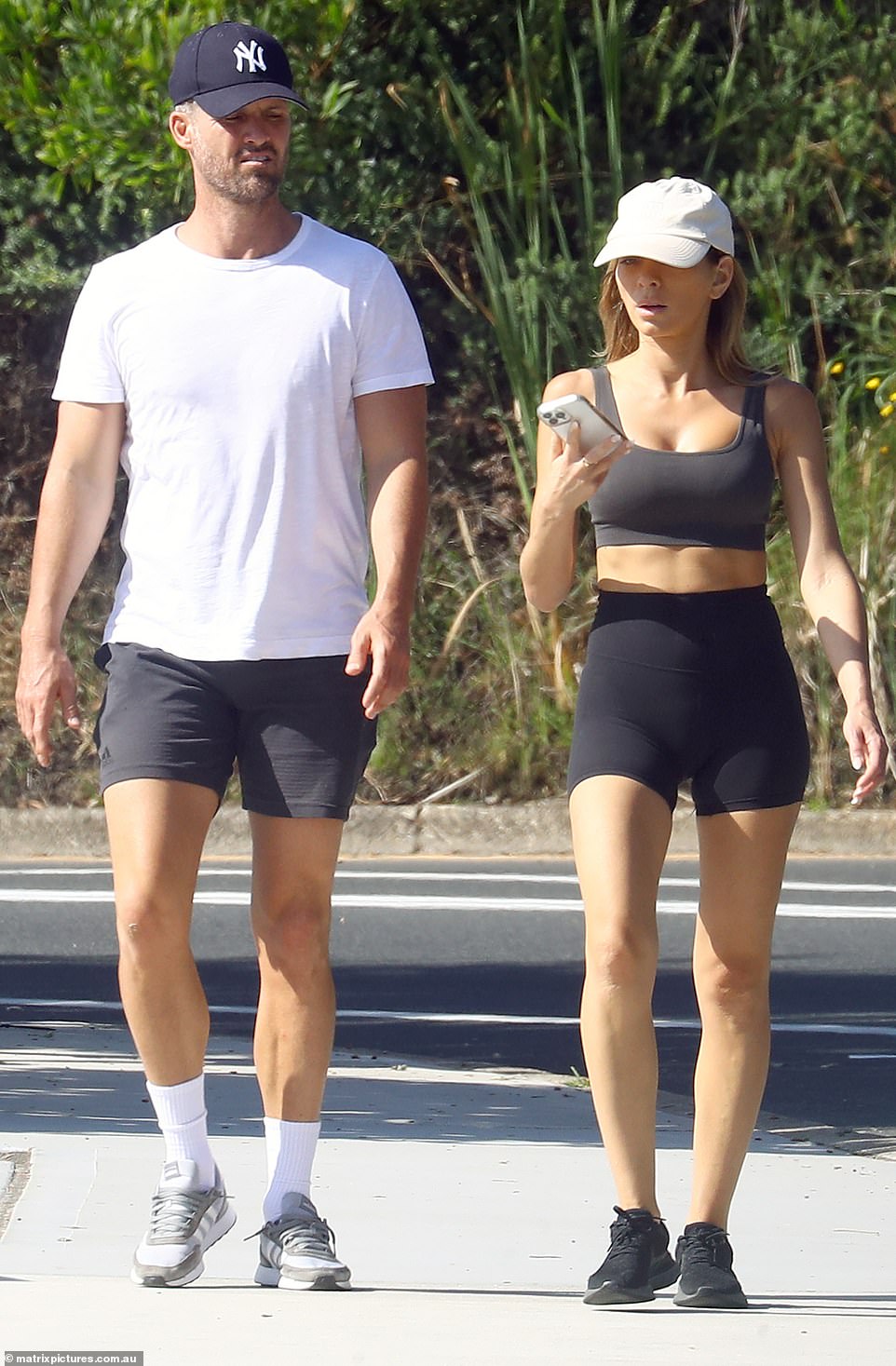 Nadia Bartel turned heads on Tuesday when she packed up the PDA with her newly confirmed boyfriend Peter Dugmore on Bronte Beach in Sydney.  both in the photo