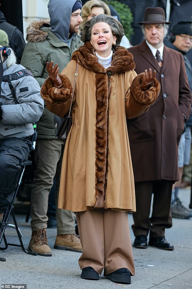 Unrecognizable: Naomi Watts was nearly unrecognizable on the set of her latest project Tuesday in New York.  The chameleon-like actress, 54, dressed in a brown fur-trimmed coat, brown pants, leather gloves and a puffy gray wig for her role in the second season of Feud.