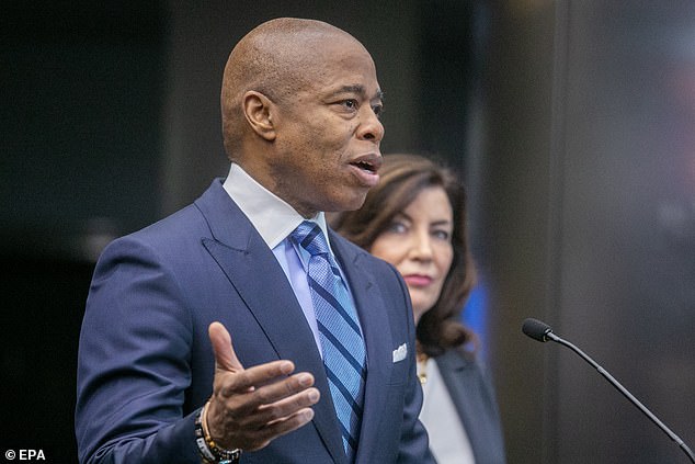 Mayor Eric Adams (L) makes a subway safety announcement January 27 in New York